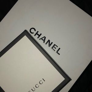 Empty Gucci and Chanel boxes